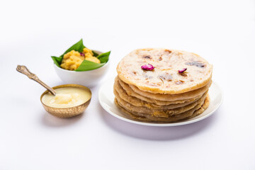Puran poli, Puran roti, Holige, Obbattu, or Bobbattlu, is Indian sweet flatbread from Maharashtra