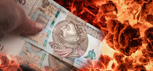 High price of coal, carbon footprint, energetic and economic crisis concept. PLN polish money 500 zloty and burning coal collage.
