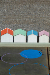 Pastel tinted, colored beach cabins - obrazy, fototapety, plakaty