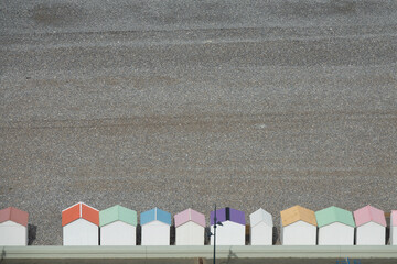 Pastel tinted, colored beach cabins - 536070596
