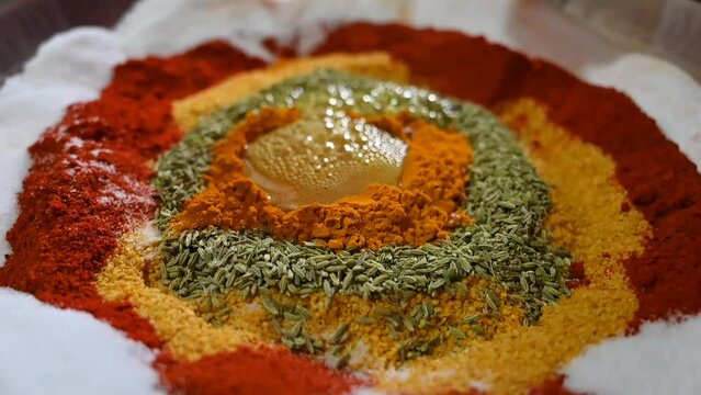 Masala Mix In Hot Oil For Making Of Green Mango Pickle.	Indian Traditional Seasonal Pickle Making Time. Indian Cuisine. Maharashtra Food