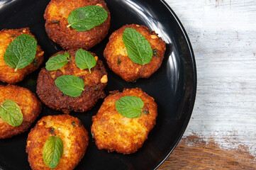 Indian potato dumpling on table