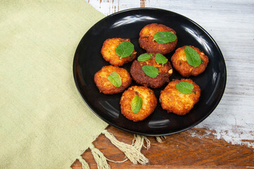 Indian potato dumpling on table
