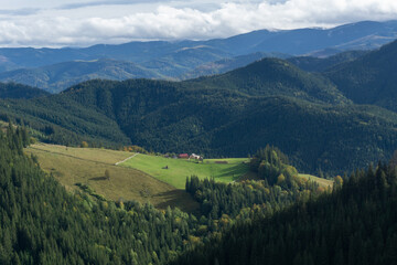 Obraz premium Panorama of the mountains. Rainy sky. Beautiful panorama of the autumn Carpathian maountains.
