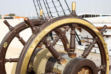 Double ship's steering wheel on the old retro battleship