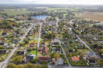 Aerial view on a little village in Sweden, Europe. Many private and residential houses and beautiful nature. 
