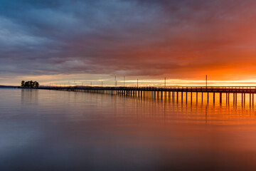 Fototapeta na wymiar Pier on lake at sunset, Rättvik, Dalarna, Sweden