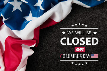Obraz na płótnie Canvas Columbus Day Background Design. American flag on black textured backgrund with a message. We will be Closed on Columbus Day.
