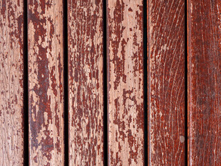 Grunge texture and background. Weathered vertical wood planks with peeling paintwork.