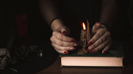 Close up woman's hand with Halloween gothic vampire manicure . Details for Halloween party concept