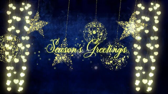 Animation of seasons greetings over golden baubles and light chains