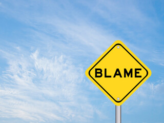 Yellow transportation sign with word blame on blue color sky background