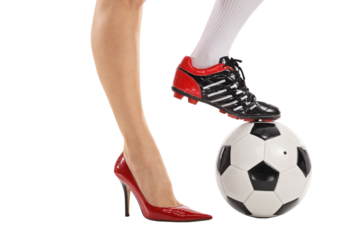 One foot in high-heeled shoe and other in soccer shoe