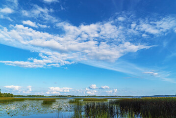 Clouds over the water surface . Lake Vrevo . Alexandrovka. Leningrad region.