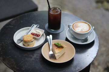 a cup of latte art on the table   