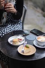 A cup of latte art and bakery on the table