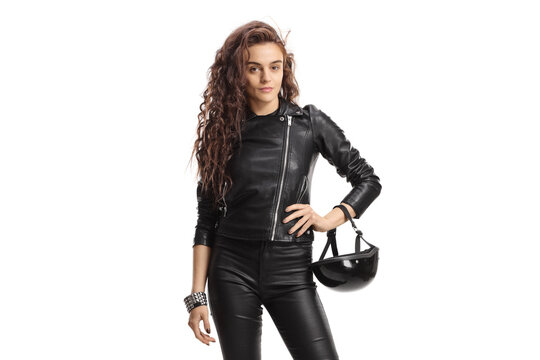 Young of a woman with long curly hair holding a biker helmet