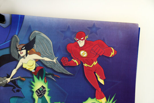 Comic magazine of The Flash and The Justice League. Flash in action. Superhero illustration. Fight of good against evil. DC Comics