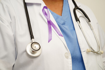 Asian woman doctor with purple ribbon, World Pancreatic Cancer day or World Alzheimer day.