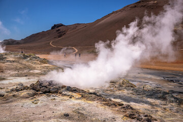 Fototapeta na wymiar Exposure of Hverir, one of the most active geothermal areas in all of Iceland. Know for its ochre coloured landscapes and the numerous fumaroles and boiling mud pools dotted over its moon-like terrain