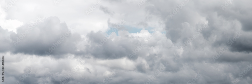 Wall mural cloudy gray sky panorama. natural background photo