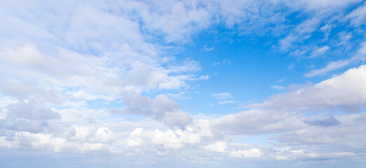 Blue sky with white altocumulus clouds on a daytime - obrazy, fototapety, plakaty