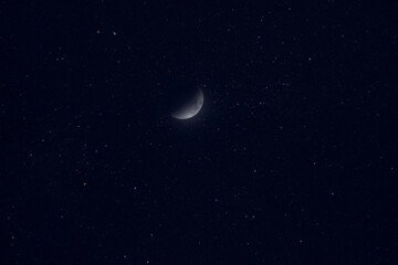 The sickle moon in the sky. Sky full of stars and moon. The crescent moon....