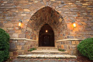 Fototapeta premium Castle archway entrance into dark interior