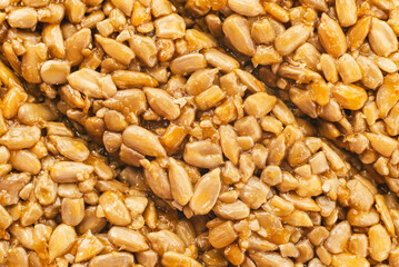 Background of sweet sunflower seeds close-up. seed dessert