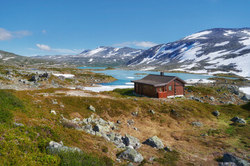 Winter view of Scandinavia, melting snow in the high mountains Norway around Hestholmen	