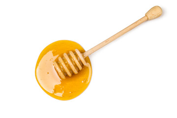 Honey dipper on puddle, isolated on white.