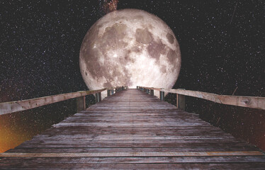 wooden bridge leading to the stars