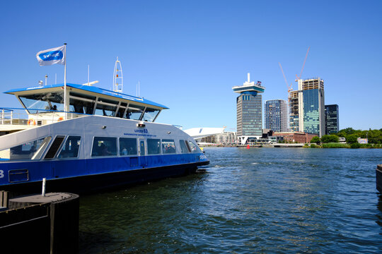 Amsterdam, The Netherlands, August 08, 2022.  Modern Ferry boat connecting Central Station and Buiksloterweg, across the river &lsquo;IJ&rsquo;.