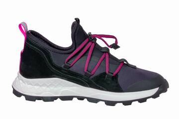 Closeup of a single of modern black sneaker or sports shoe isolated on a white background. Clipping path. Elegant and trendy mans shoe. Macro.