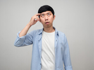 Asian man feels dizziness hold his head isolated