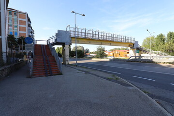 Fototapeta na wymiar Concrete footbridge over motorway. Stock photo.
