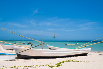 Naklejka na ściany i meble Boats at the beach of Progreso near Merida in Mexico