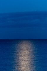 Mon, Denmark A moonrise over the Baltic Sea