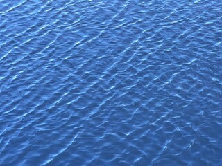 Rippled blue river water background.