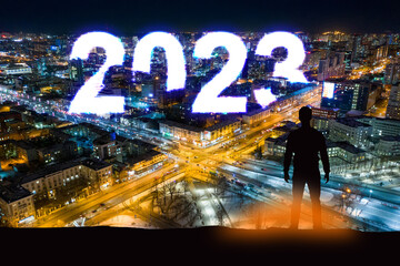 Business man on future night city. New Year 2023