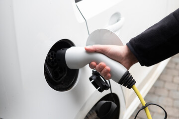 Electric car charging at home - 536126556