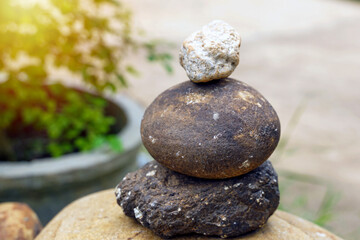 Fototapeta na wymiar Stone Balance is an art that arises from stacking rocks together. Soft and selective focus. 