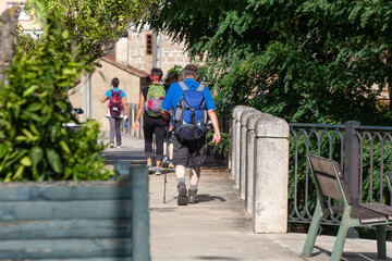 A group of pilgrims walks in the second stage of the Spiritual Variation of the Portuguese Camino de Santiago. Place of Cabanelas, Ribadumia in the Armenteira to Vilanova de Arousa stage.
