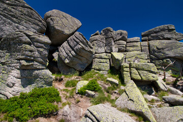 Rock formation Three pigs - stones in Poland. Krkonose.