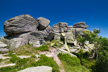 Rock formation Three pigs - stones in Poland. Krkonose.