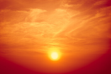 Naklejka na ściany i meble beautiful orange sunset sky in summer high season hot weather global warming