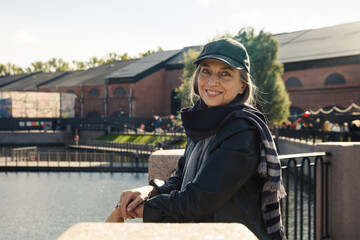Portrait of  elderly woman at  embankment