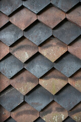 colored small clay roof tiles in a geometric pattern