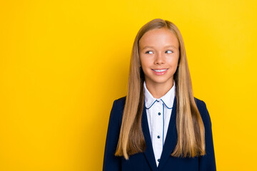 Portrait of nice lovely schoolgirl with long hairstyle dressed blue jacket look empty space...