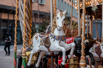 Colorful merry go round at the Saint Louise Square, Metz, France